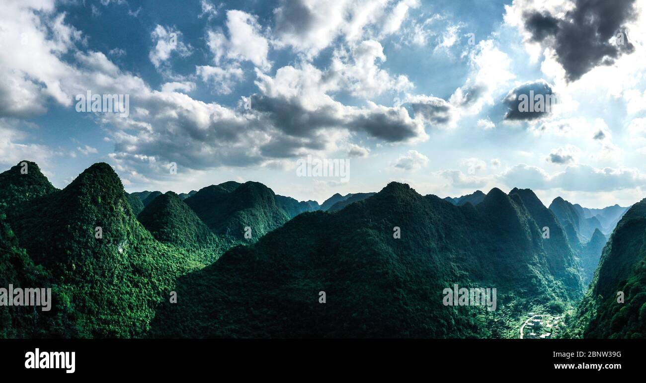 (200516) -- DAHUA, May 16, 2020 (Xinhua) -- Aerial photo taken on May 14, 2020 shows the scenery of Qibainong national geopark in Dahua Yao Autonomous County, south China's Guangxi Zhuang Autonomous Region. (Xinhua/Zhang Ailin) Stock Photo