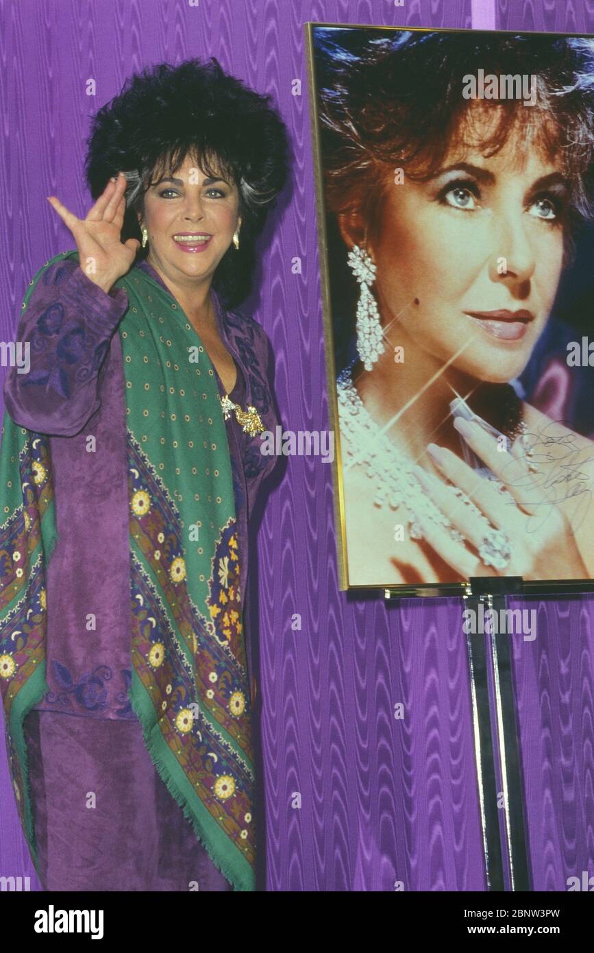 Elizabeth Taylor American actress at Selfridges London promoting her perfume Passion in 1989 Stock Photo