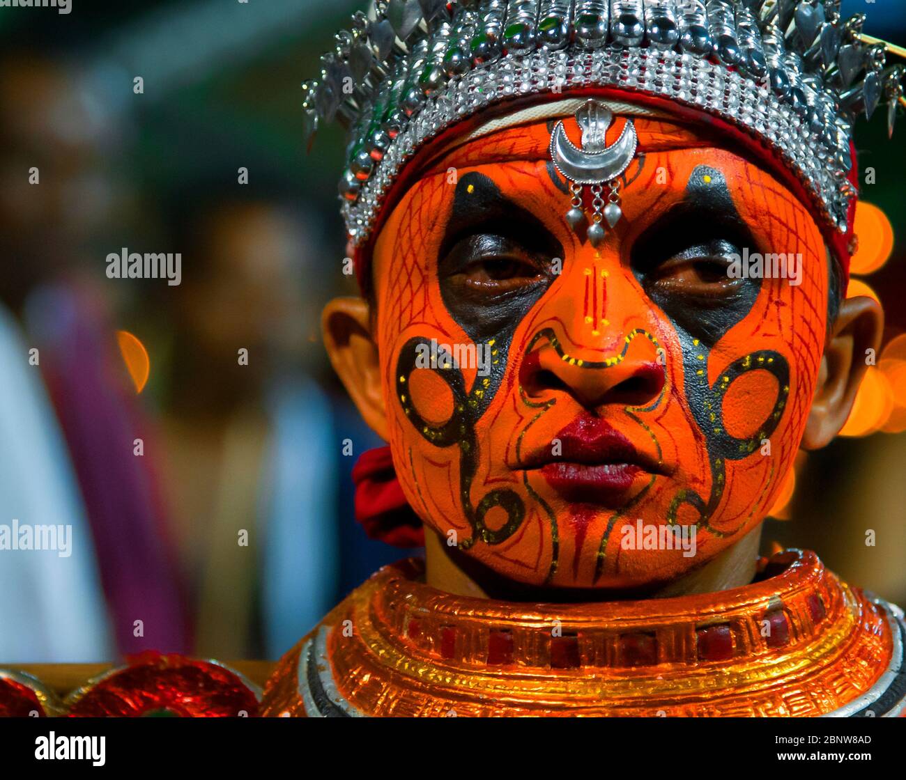 Nagakaali Theyyam | Ritual Art Form of Kerala, Thirra or Theyyam thira is a ritual dance performed in 'Kaavu'(grove)& temples of the Kerala, India Stock Photo