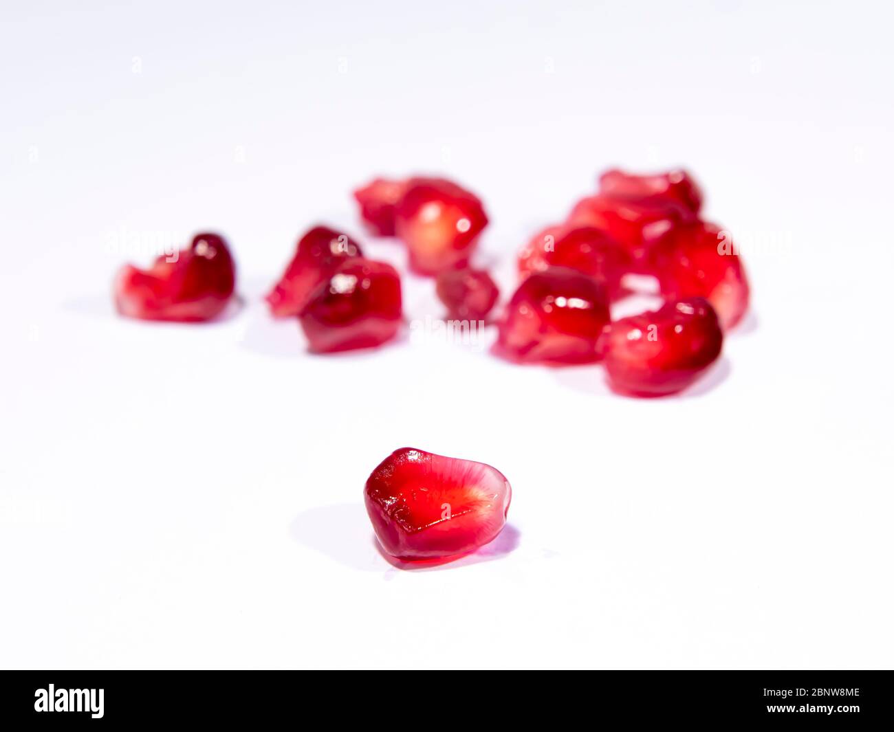 Red juicy pomegranates seeds hi-res stock photography and images - Alamy