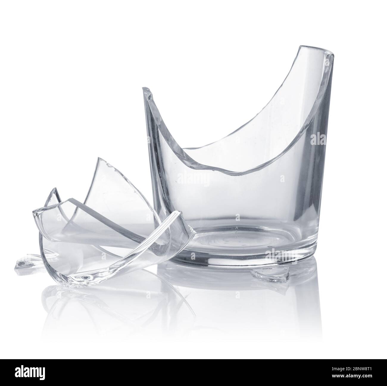 Empty broken drinking glass isolated on white Stock Photo