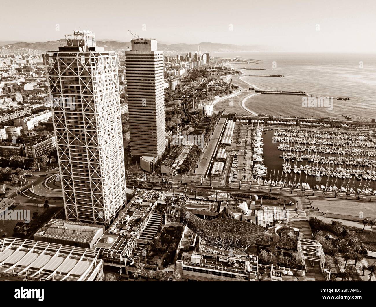 Twins towers Mapfre tower and Hotel Arts and port aerial view Barcelona ...