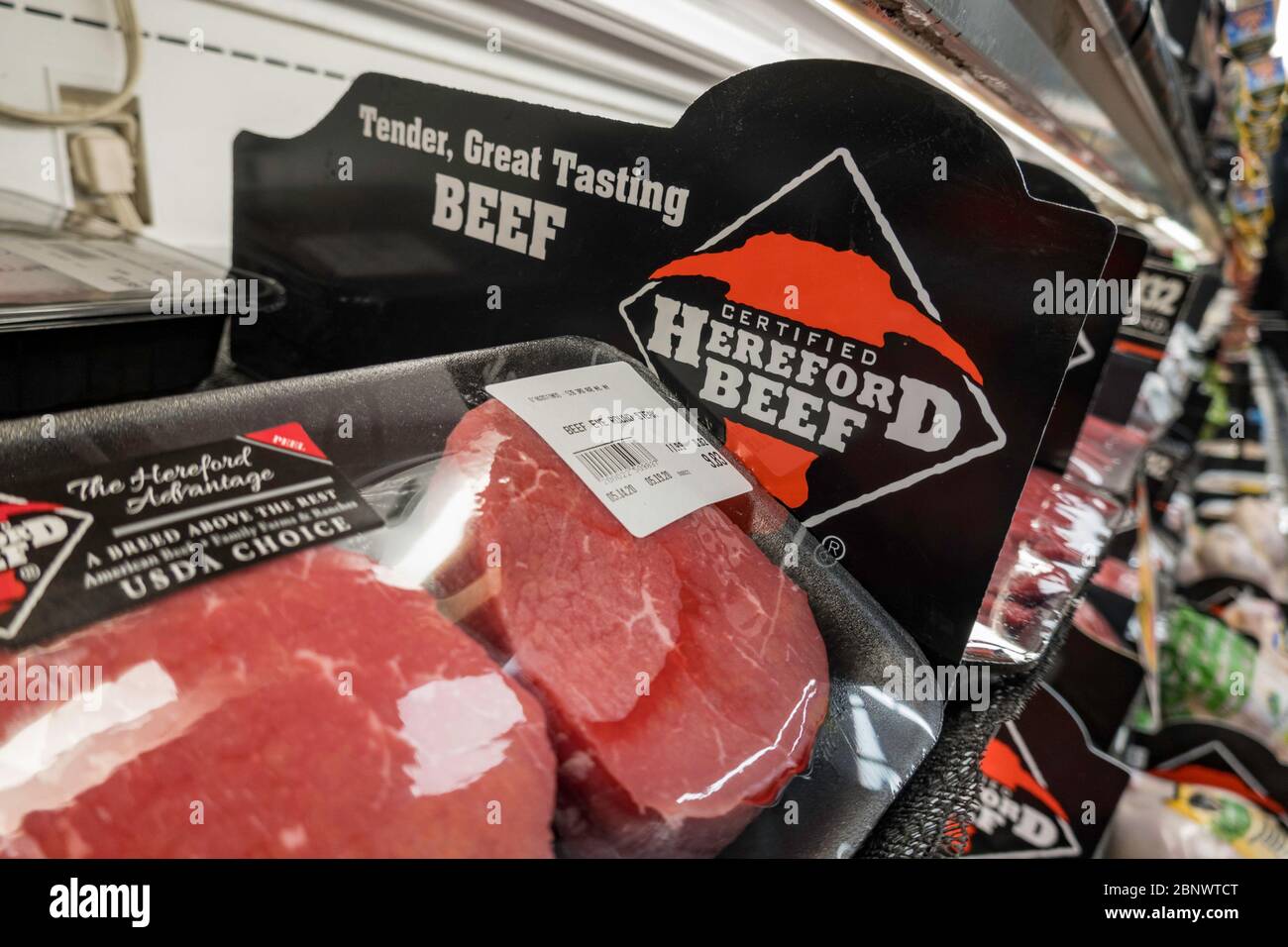 Hereford Brand Steaks in the Meat Case , Grocery Store, NYC, USA Stock Photo