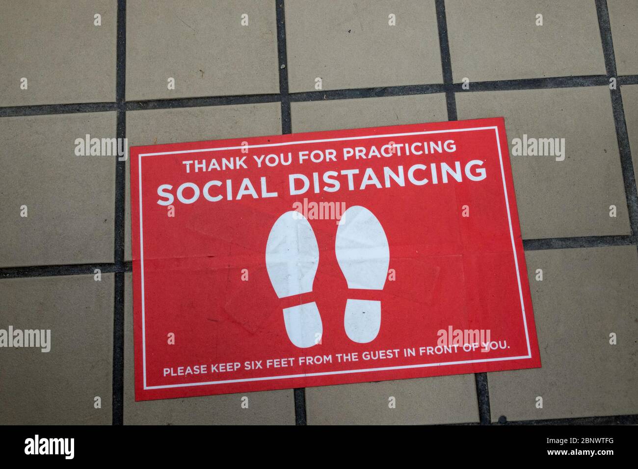 Social Distancing Markers in the aisle at a Grocery Store, April 2020, New York City, USA Stock Photo