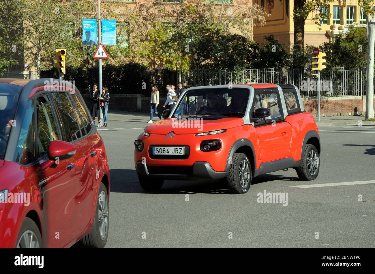 Electric vehicles circulating in Barcelona city Stock Photo