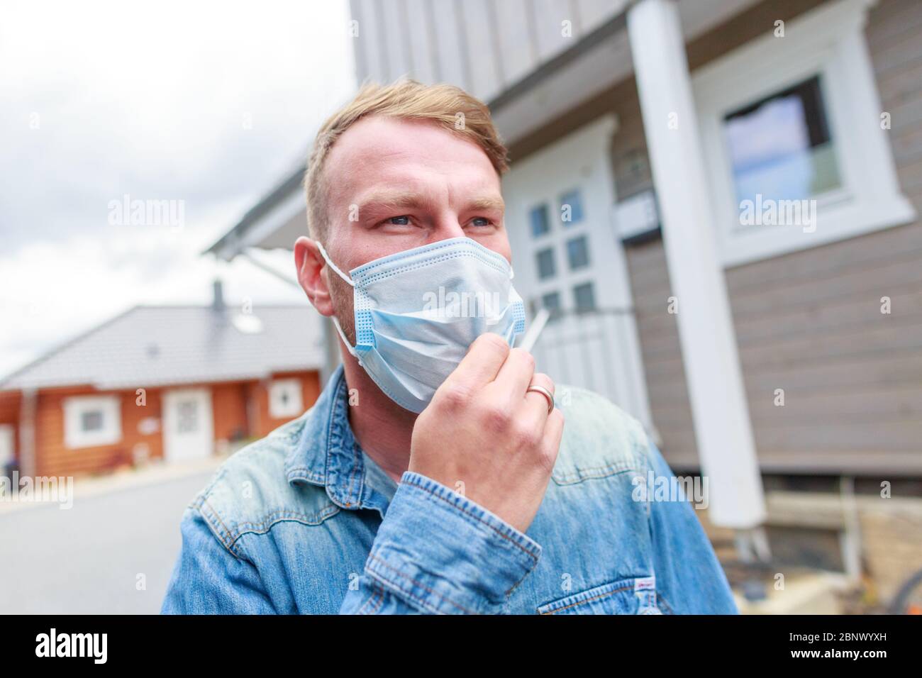 A young man with a protection mask Stock Photo - Alamy