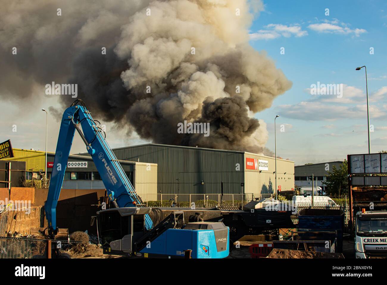 Over 100 Firefighters tackle a blaze at Saimaxx Bulders Merchants on Alfreds Way Barking, London. Friday 16th May 2020. Stock Photo