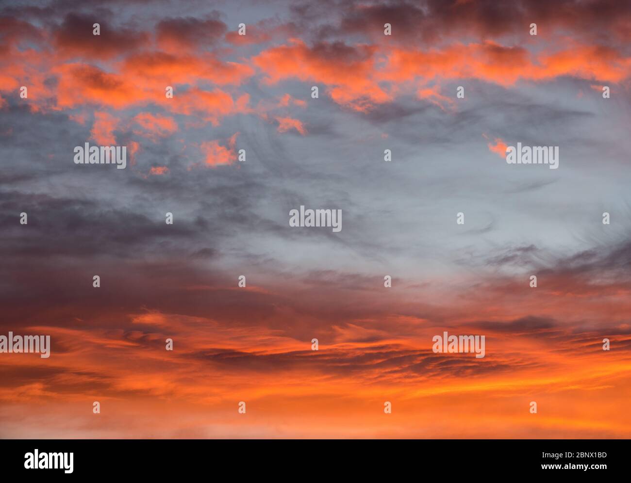 Sunset red sky with clouds horizontal background Stock Photo - Alamy