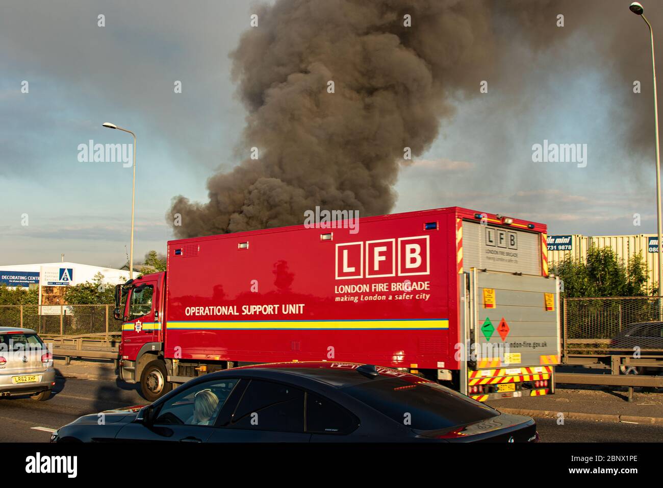 Over 100 Firefighters tackle a blaze at Saimaxx Bulders Merchants on Alfreds Way Barking, London. Friday 16th May 2020. Stock Photo