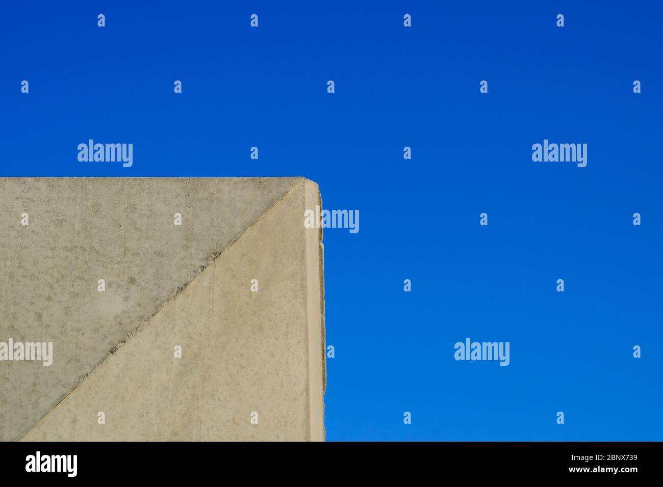 precast concrete panels, concrete footing with blue sky in background Stock Photo