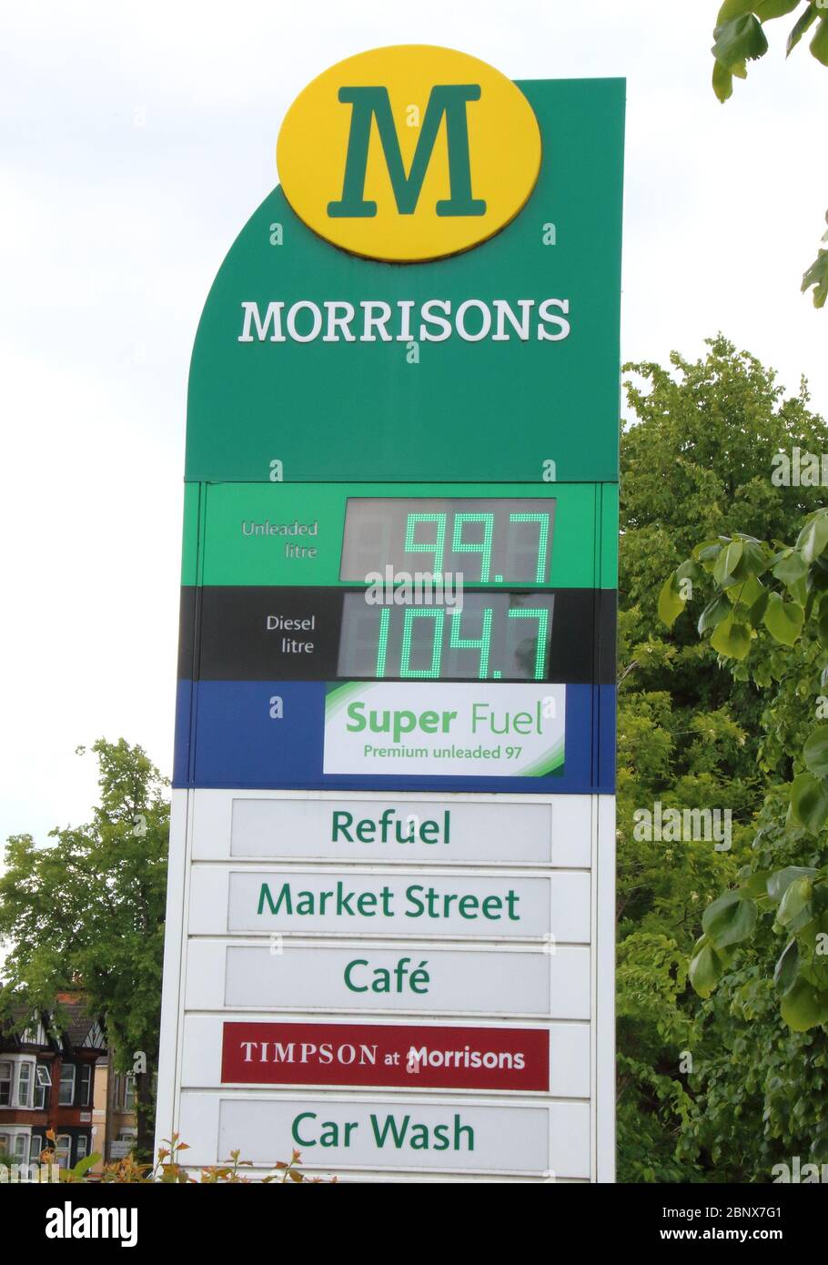 A Morrisons petrol station sells unleaded petrol at 99.7p per litre, the first time since 2016 petrol has been sold below £1 per litre.The global oil market crash triggered by the coronavirus lockdown has seen the crude oil price plummet to a near 20-year low. Now, led by UK Supermarket chains, Unleaded petrol is now on sale throughout the country at below £1 per litre. Stock Photo