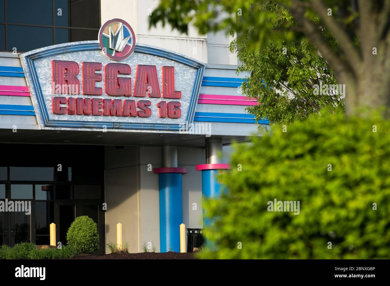 A logo sign outside of a Regal Cinemas movie theater location in Wilmington, Delaware on May 4, 2020. Stock Photo