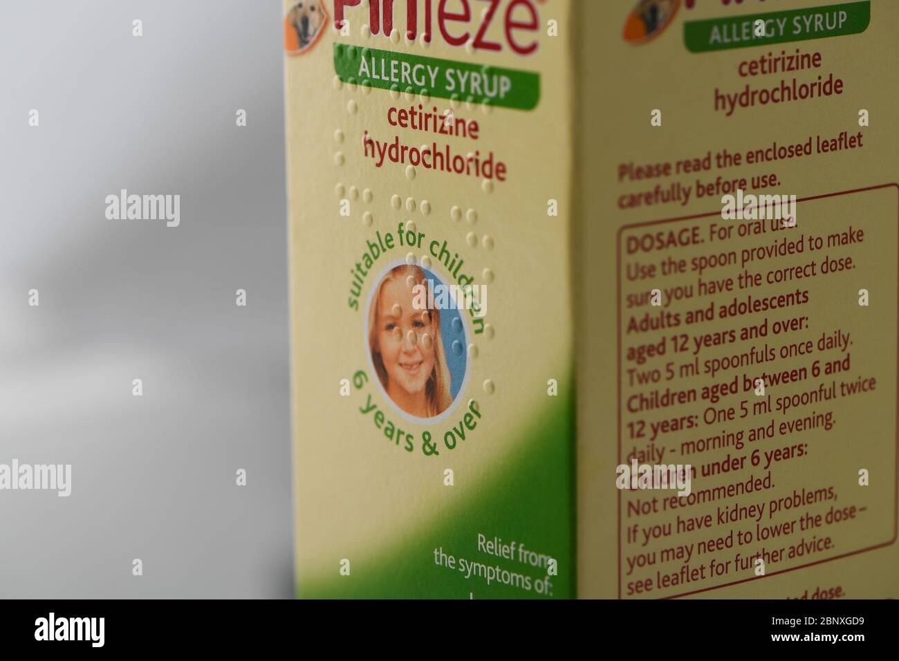 Piriteze allergy syrup packet close up image of brail markings on medicine box label to assist partially sighted and the blind. Stock Photo
