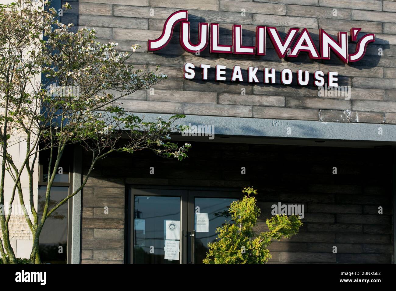 A logo sign outside of a Sullivans Steakhouse restaurant location in Wilmington, Delaware on May 4, 2020. Stock Photo