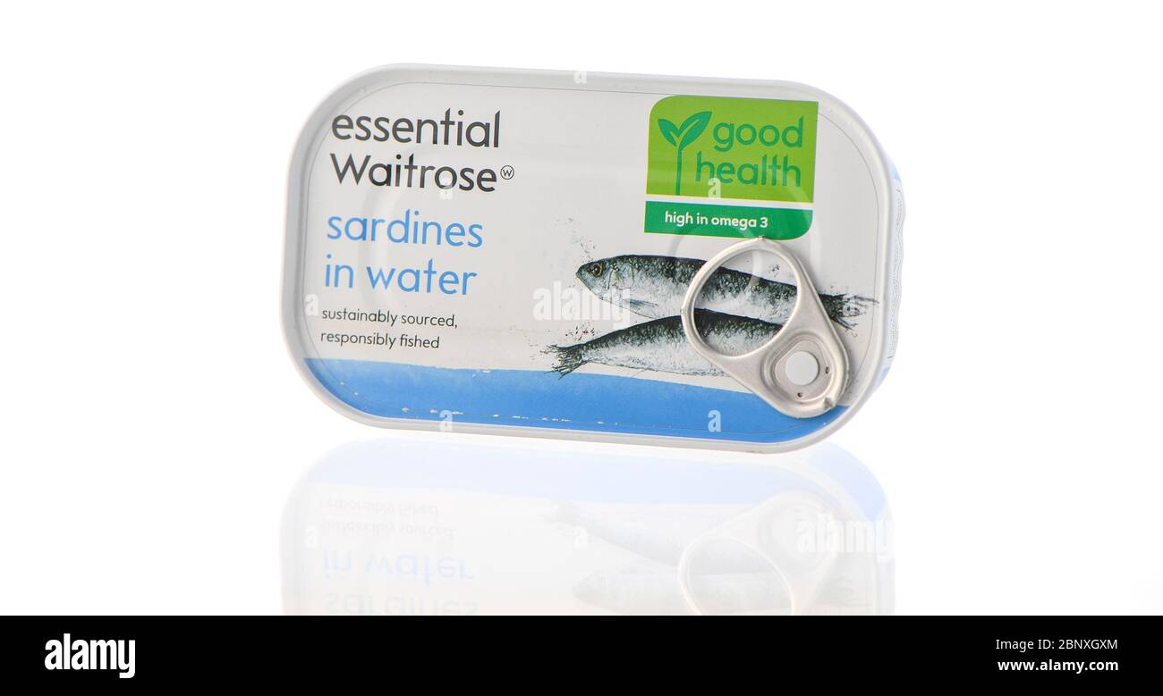 Essential Waitrose sardines in a small tin shot in the studio isolated