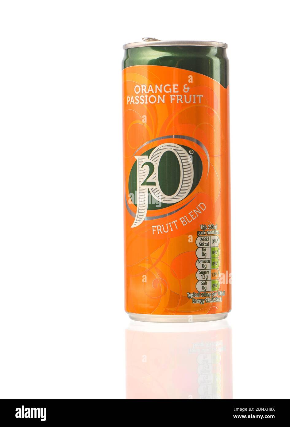 A can of orange and passion fruit J2O fruit blend drink shot in the studio isolated against a white background with a reflection. Stock Photo