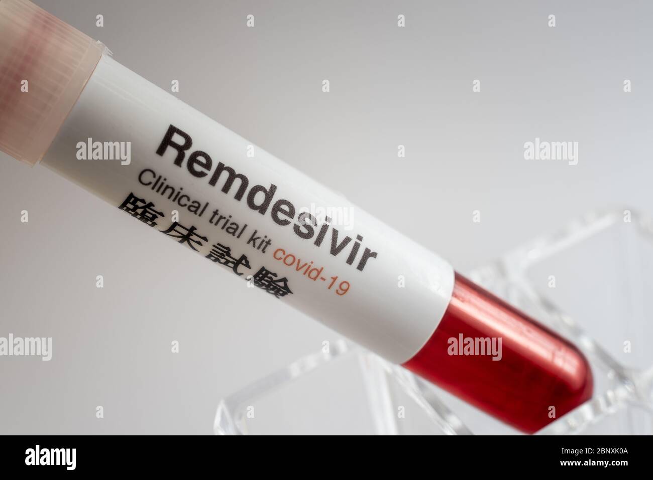 test tube with a small amount of blood and Remdesivir for laboratory testing against covid-19, Denmark, May 16, 2020 Stock Photo