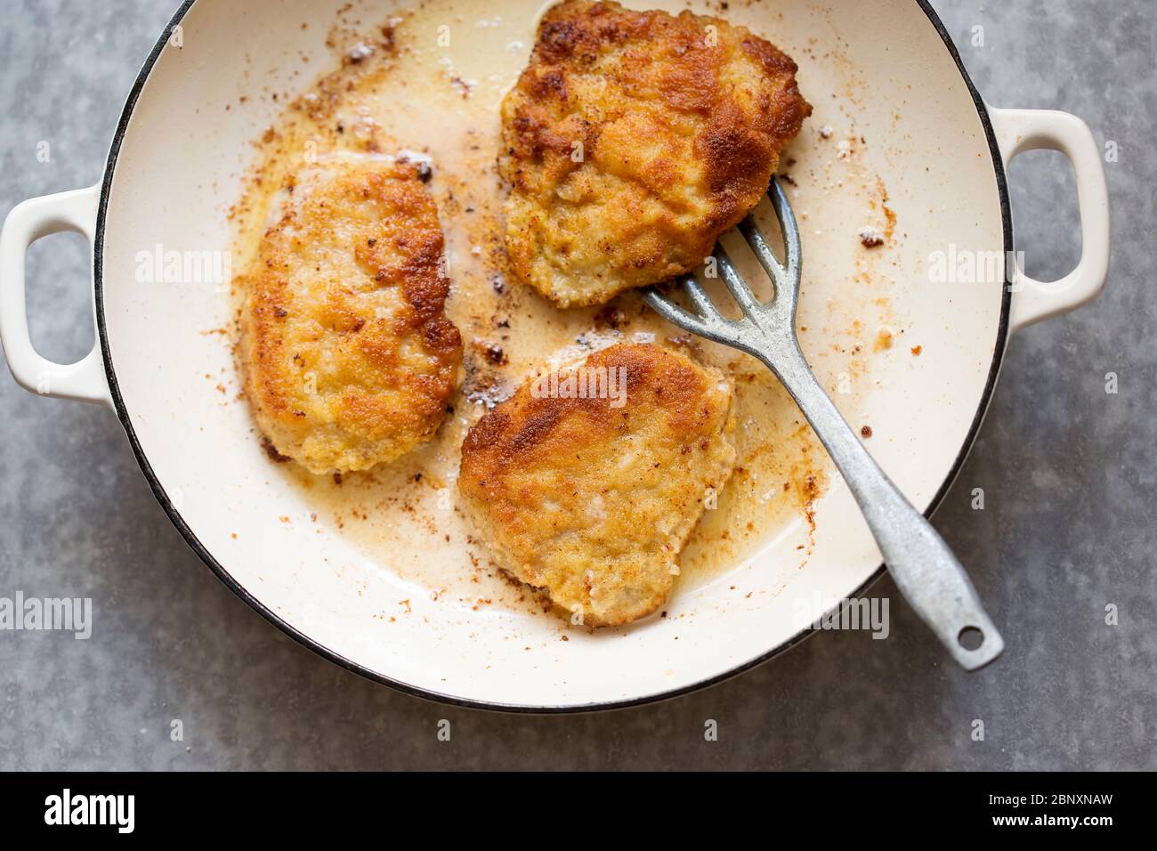 Kotlet schabowy fried polish bread crumbs coated pork chops Stock