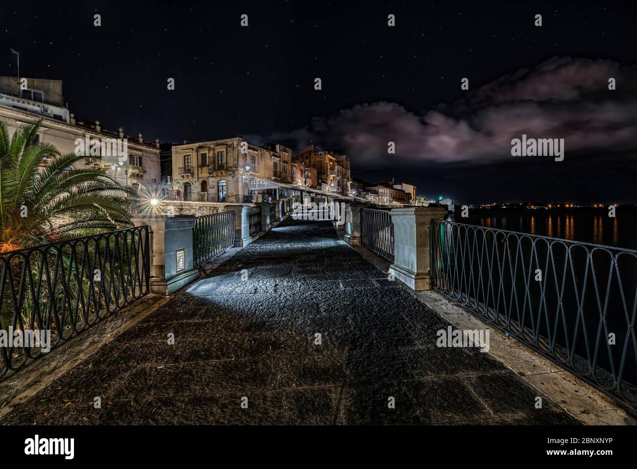 Syracuse Sicily, Otigia. the Alfeo seafront and source Aretusa in the night Stock Photo