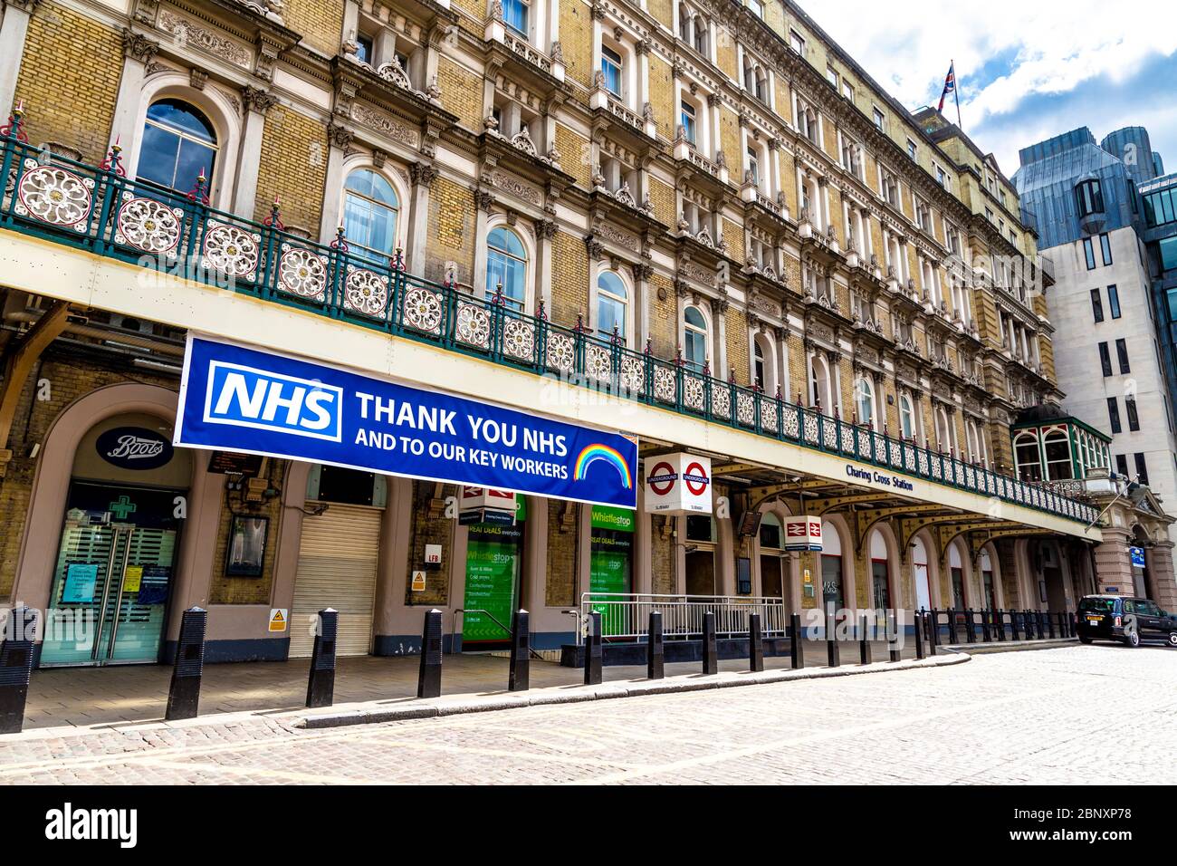 16 May 2020 London, UK - Thank you message banner to NHS nurses, doctors and key workers on the facade of Charing Cross Station during the Coronavirus pandemic lockdown Stock Photo