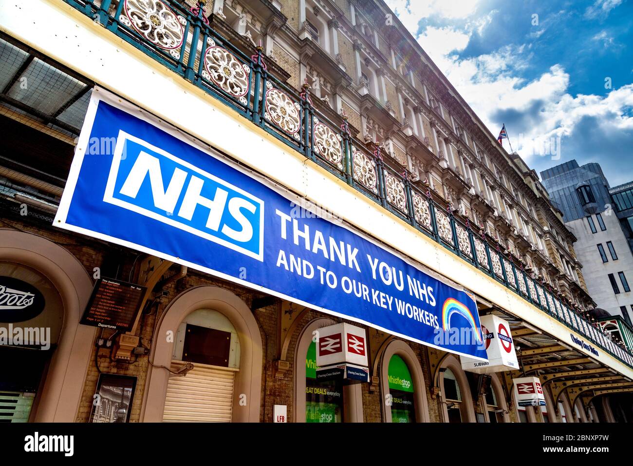 16 May 2020 London, UK - Thank you message banner to NHS nurses, doctors and key workers on the facade of Charing Cross Station during the Coronavirus pandemic lockdown Stock Photo