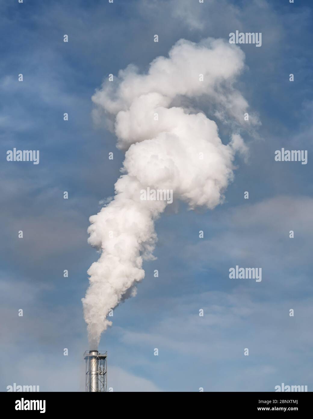 Smoke coming from the chimneys of the plant factory. Air pollution concept Stock Photo