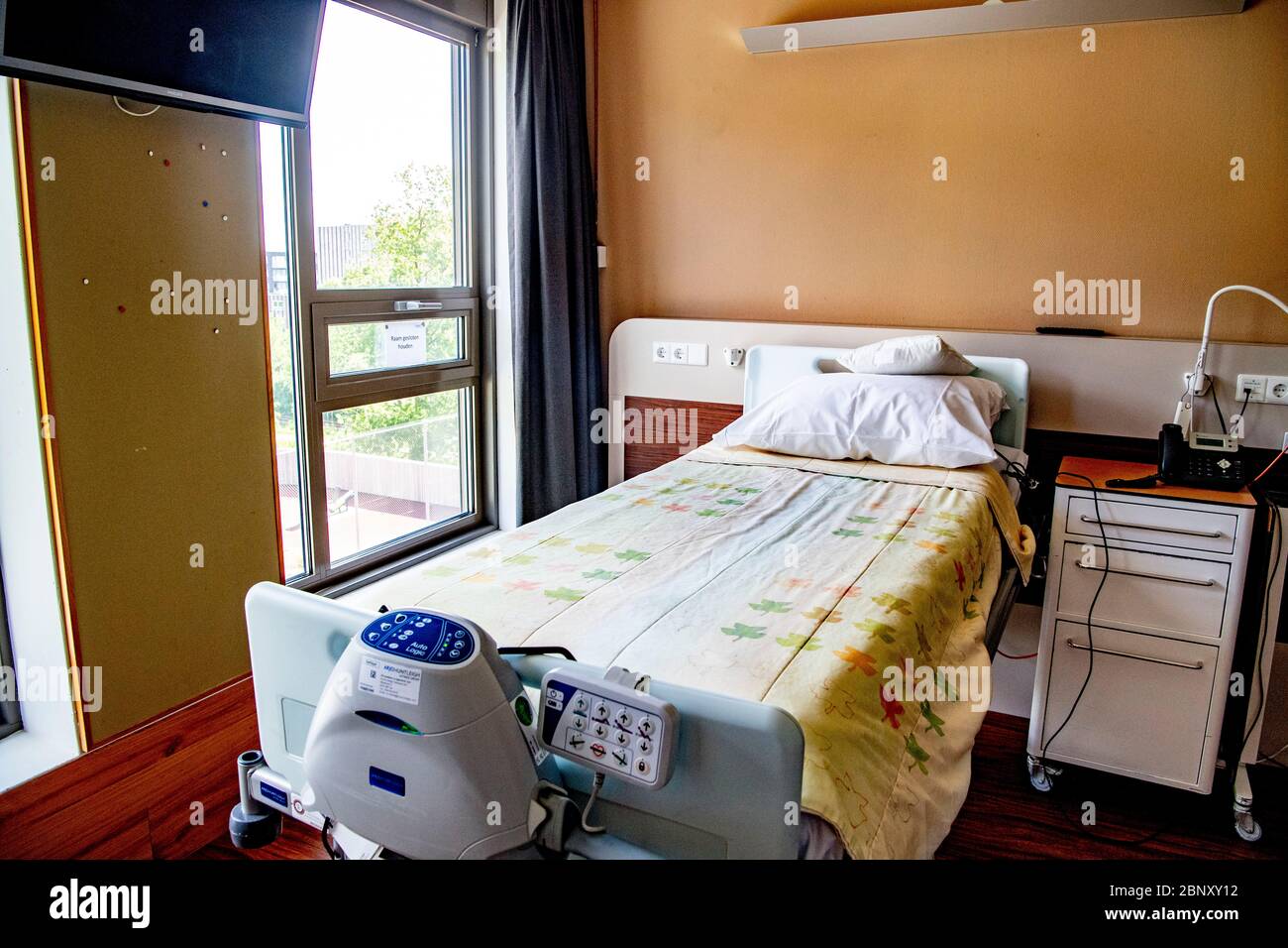 A hospital bed at the rehab centre.Admission of recovering ICU corona virus patients for a specialist medical rehabilitation program with lung pneumonia corona doctors developed at the Basalt rehabilitation centre. Stock Photo