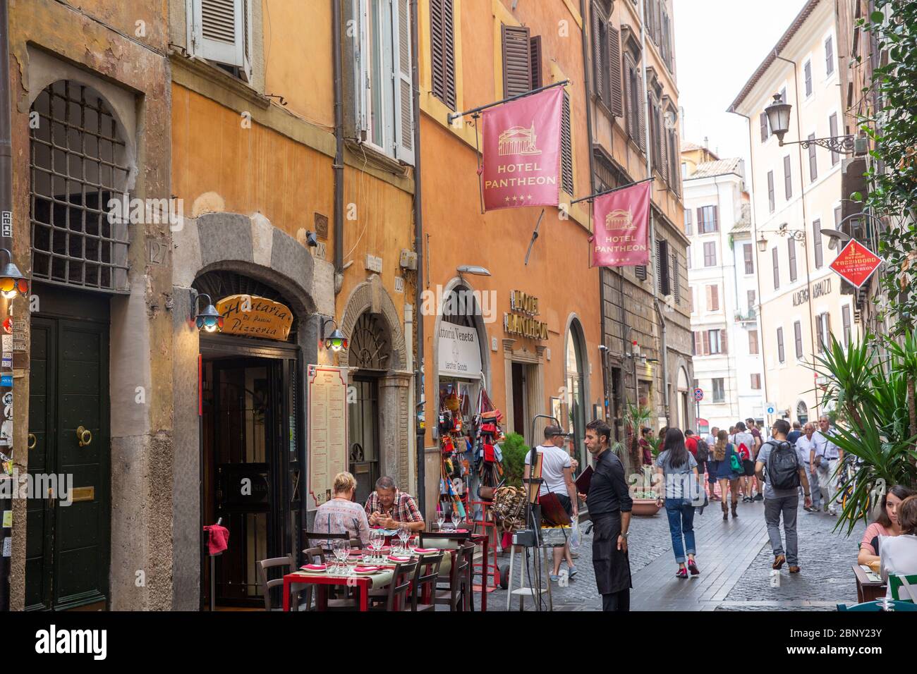 Rome city centre and people stroll the streets of Rome and enjoy lunch at a local cafe restaurant, Italy,Europe, 2018 Stock Photo