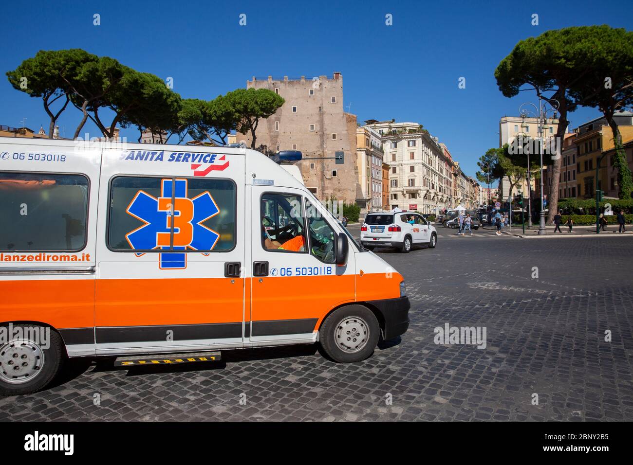Italian ambulance driving on cobbled streets in the centre of Rome,Italy Stock Photo