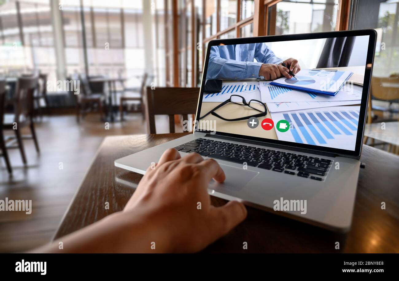Online Group Videoconference On Laptop video call with teacher on computer, learning online from home videoconference application chat communicate Stock Photo