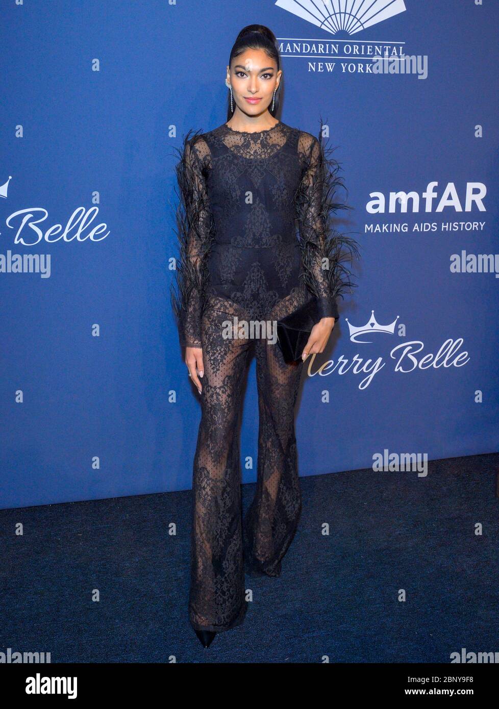 Sheer black lace jumpsuit hi-res stock photography and images - Alamy