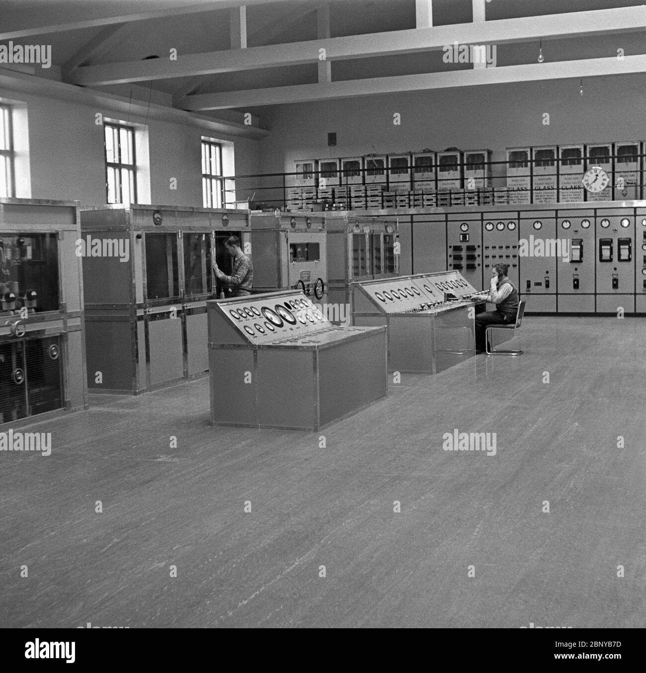 Yle's radio transmission unit in Lahti radio station, 1930's. View of  transmitter hall showing units with water cooled tubes and control desk of  150 0211 Stock Photo - Alamy