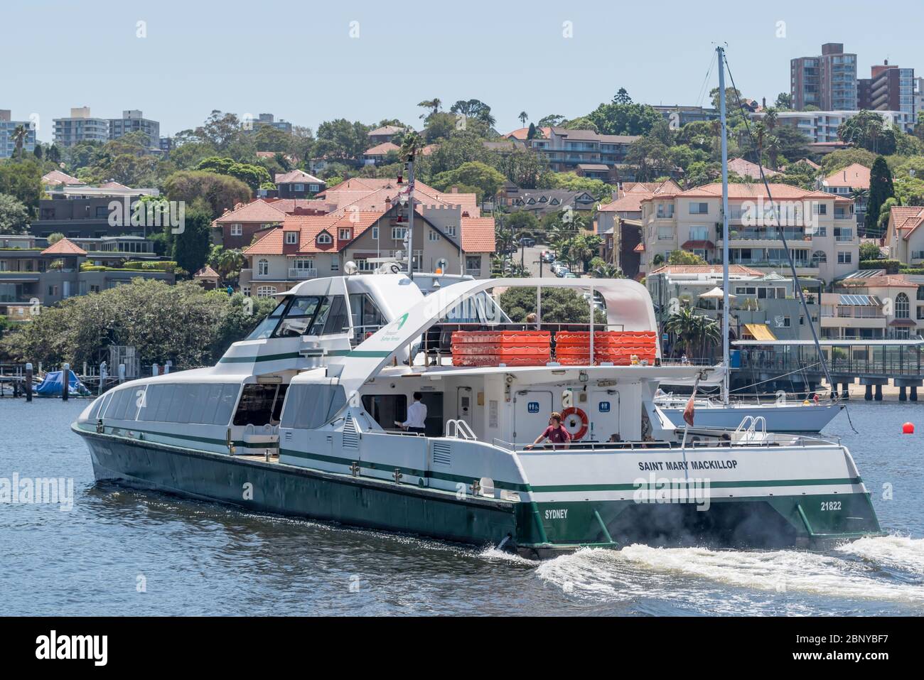 The Super Cat Class Sydney Ferry catamaran named Saint Mary Mackillop departs from North Sydney Wharf in Sydney Harbour, Australia Stock Photo