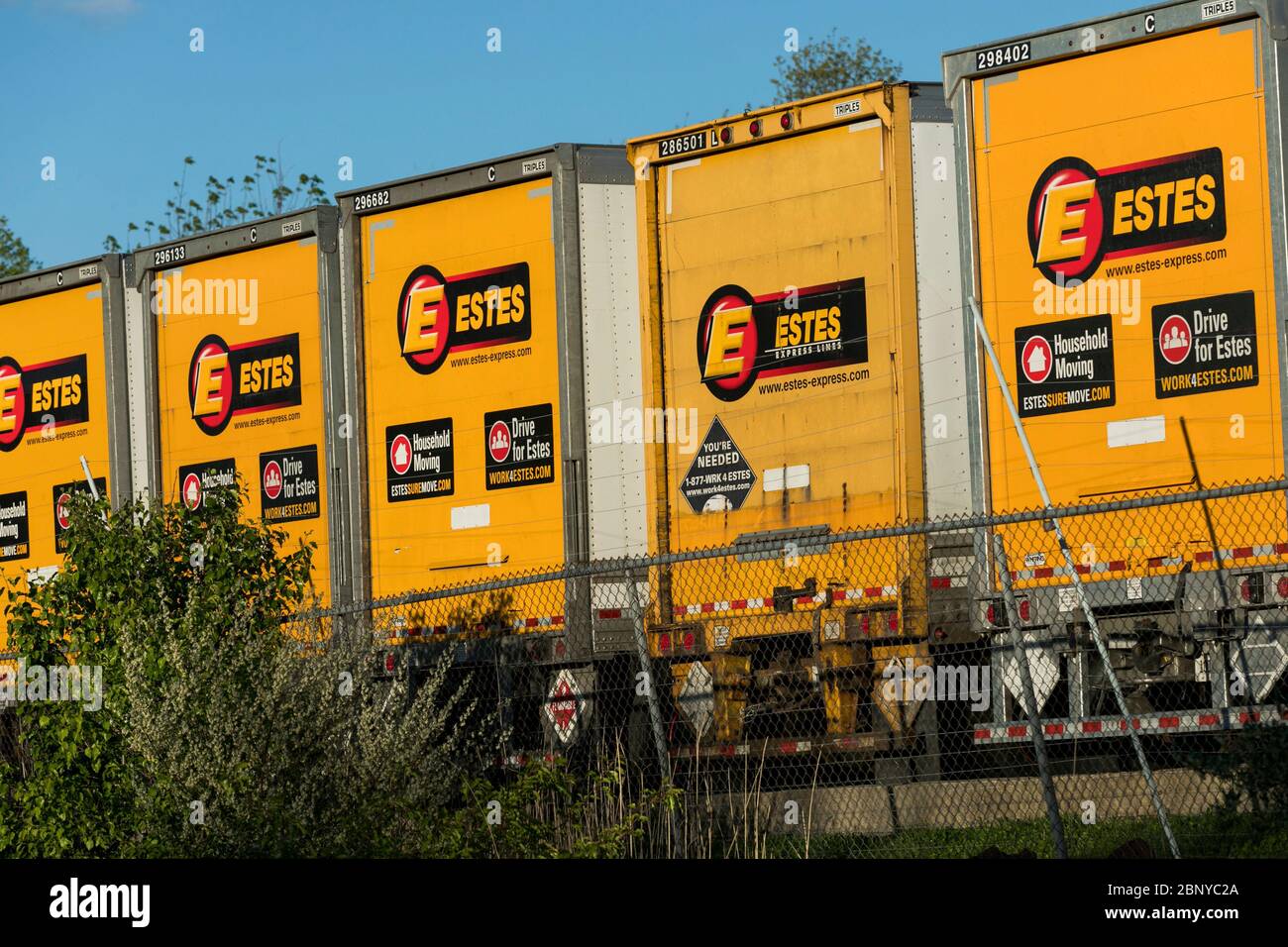 Truck trailers with logos outside of a facility occupied by Estes Express Lines in Norristown, Pennsylvania on May 4, 2020. Stock Photo