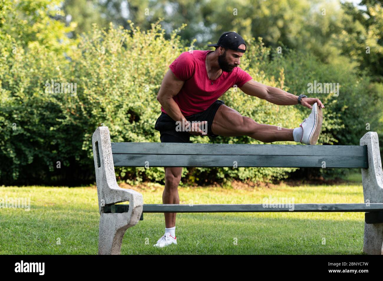 Guy stretching body muscles on hi-res stock photography and images - Alamy