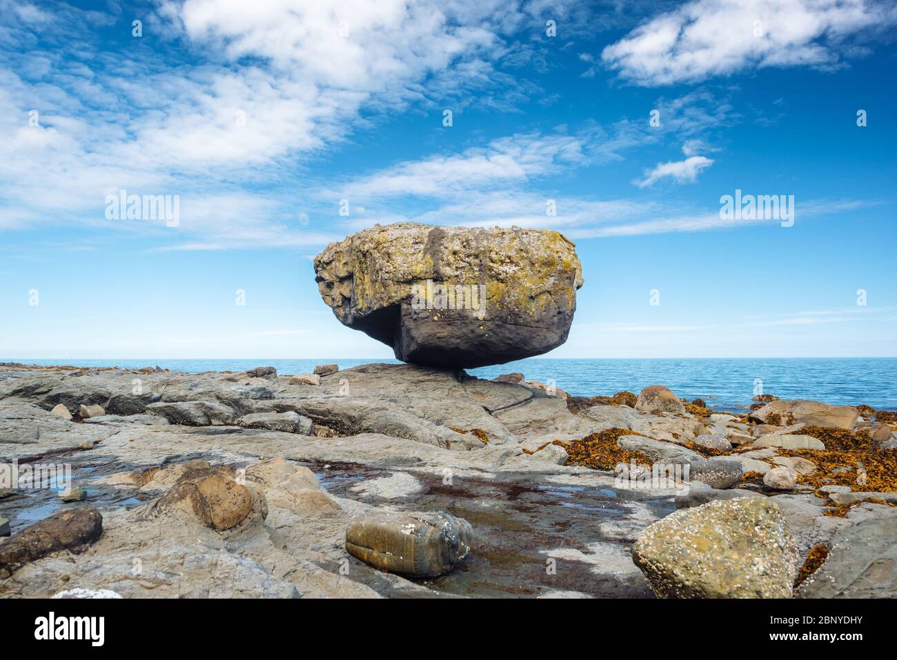 Balance Rock, a popular tourist destination in Haida Gwaii, British Columbia, Canada Stock Photo