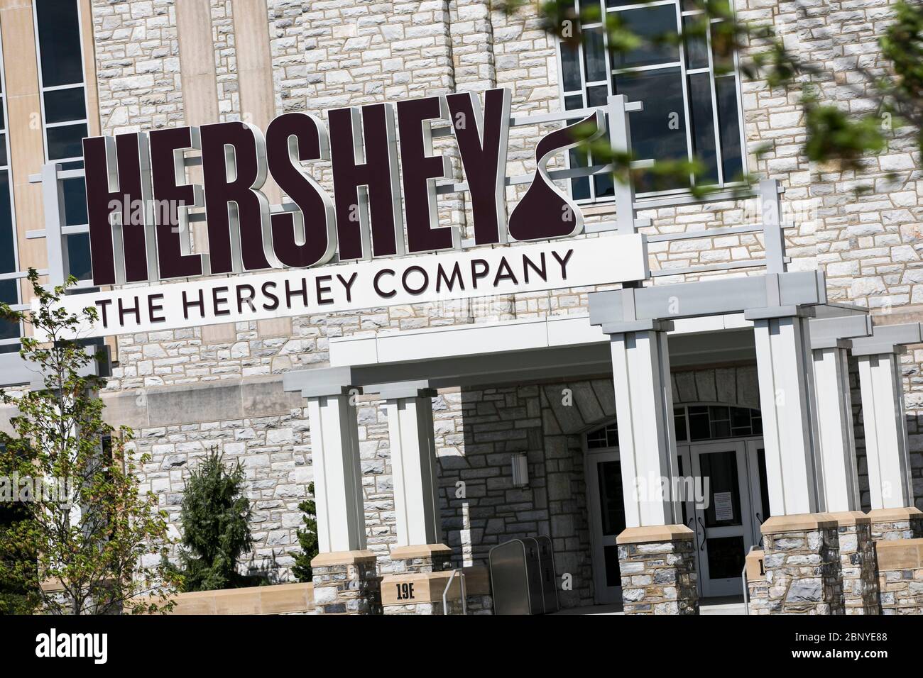 A logo sign outside of the headquarters of The Hershey Company (Hershey