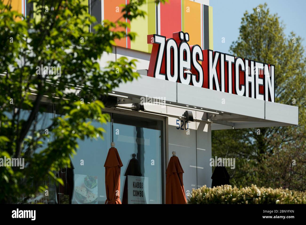 A Logo Sign Outside Of A Zoes Kitchen Restaurant Location In Woodbridge Virginia On January 21 2019 Stock Photo Alamy
