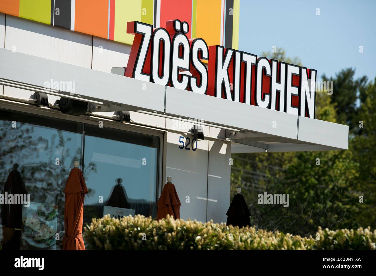 A logo sign outside of a Zoes Kitchen restaurant location in Plymouth Meeting, Pennsylvania on May 4, 2020. Stock Photo