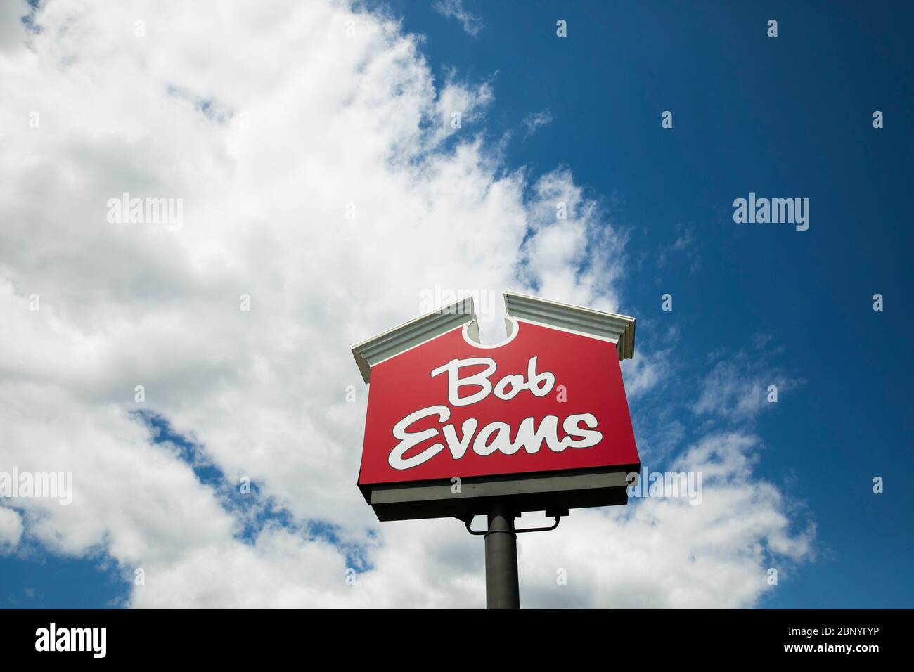 A logo sign outside of a Bob Evans restaurant location in Harrisburg