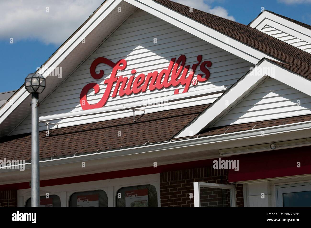 A logo sign outside of a Friendly's restaurant location in Hershey, Pennsylvania on May 4, 2020. Stock Photo