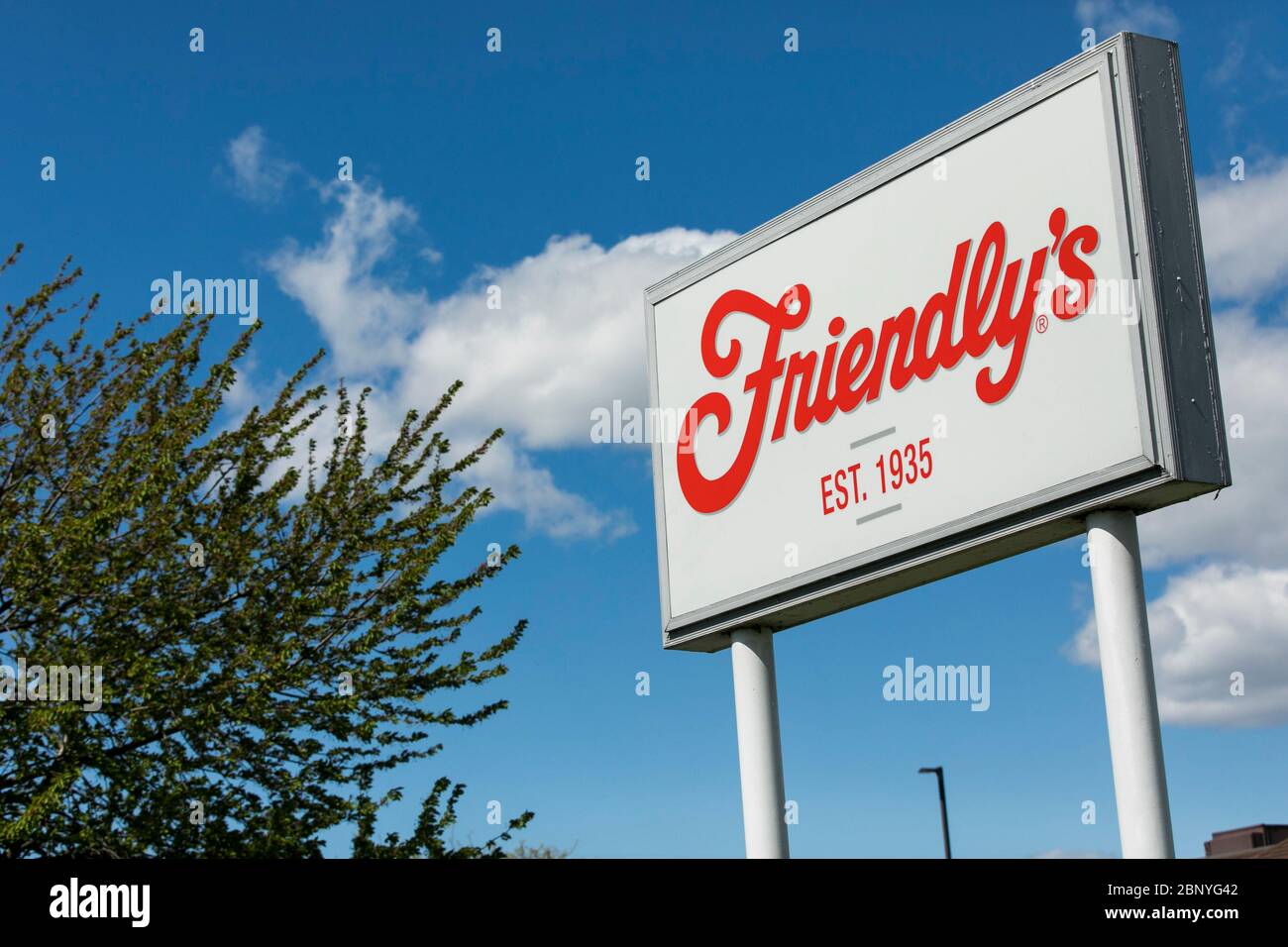 A logo sign outside of a Friendly's restaurant location in Hershey, Pennsylvania on May 4, 2020. Stock Photo