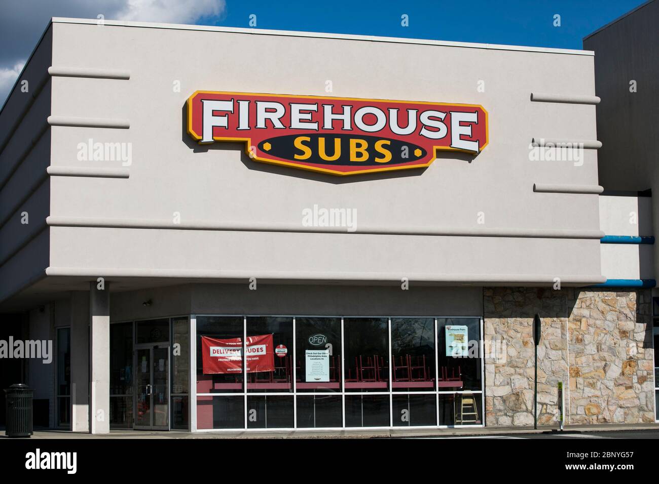 A logo sign outside of a Firehouse Subs restaurant location in Wyomissing, Pennsylvania on May 4, 2020. Stock Photo