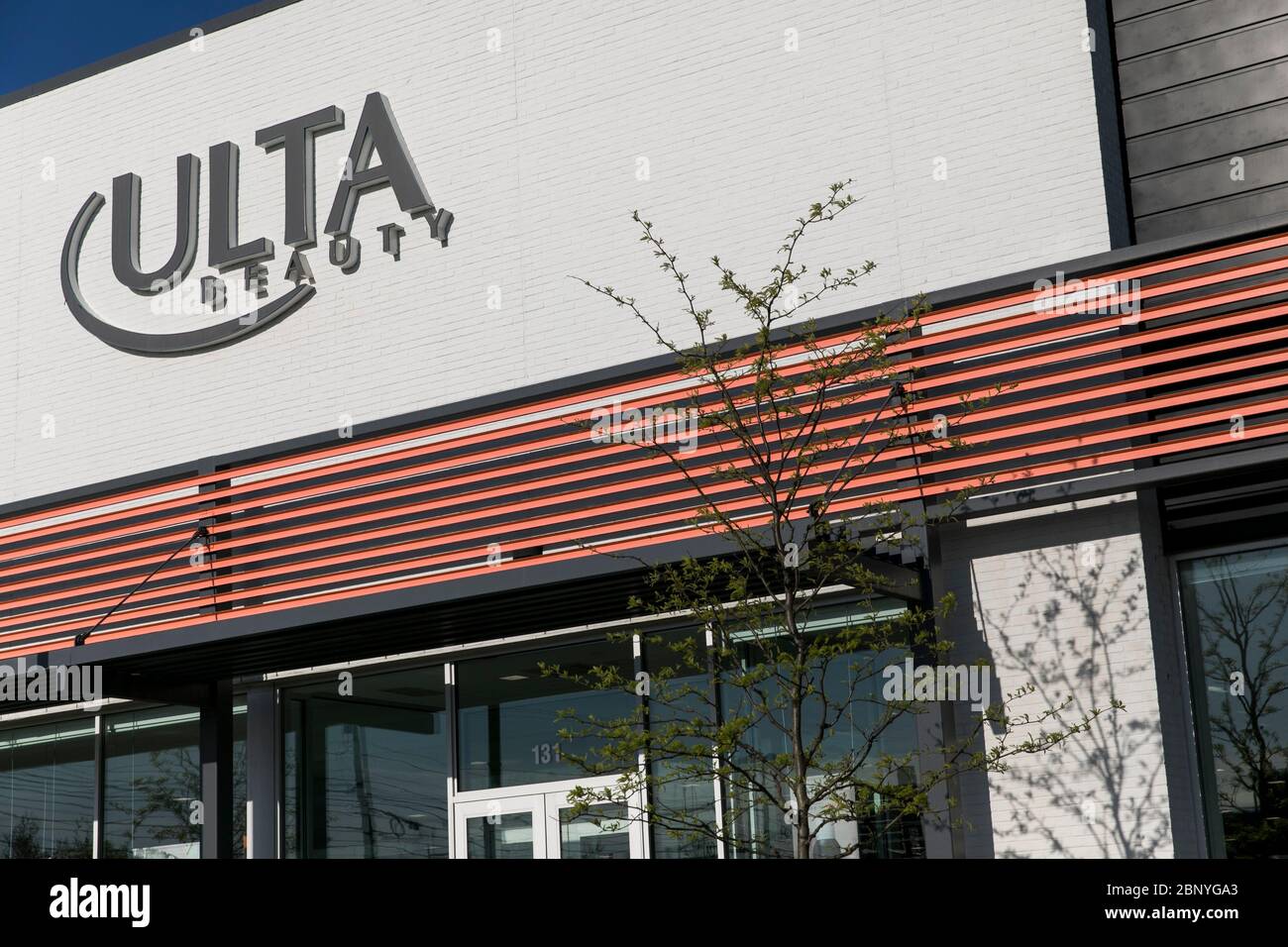 A logo sign outside of a Ulta Beauty retail store location in King of