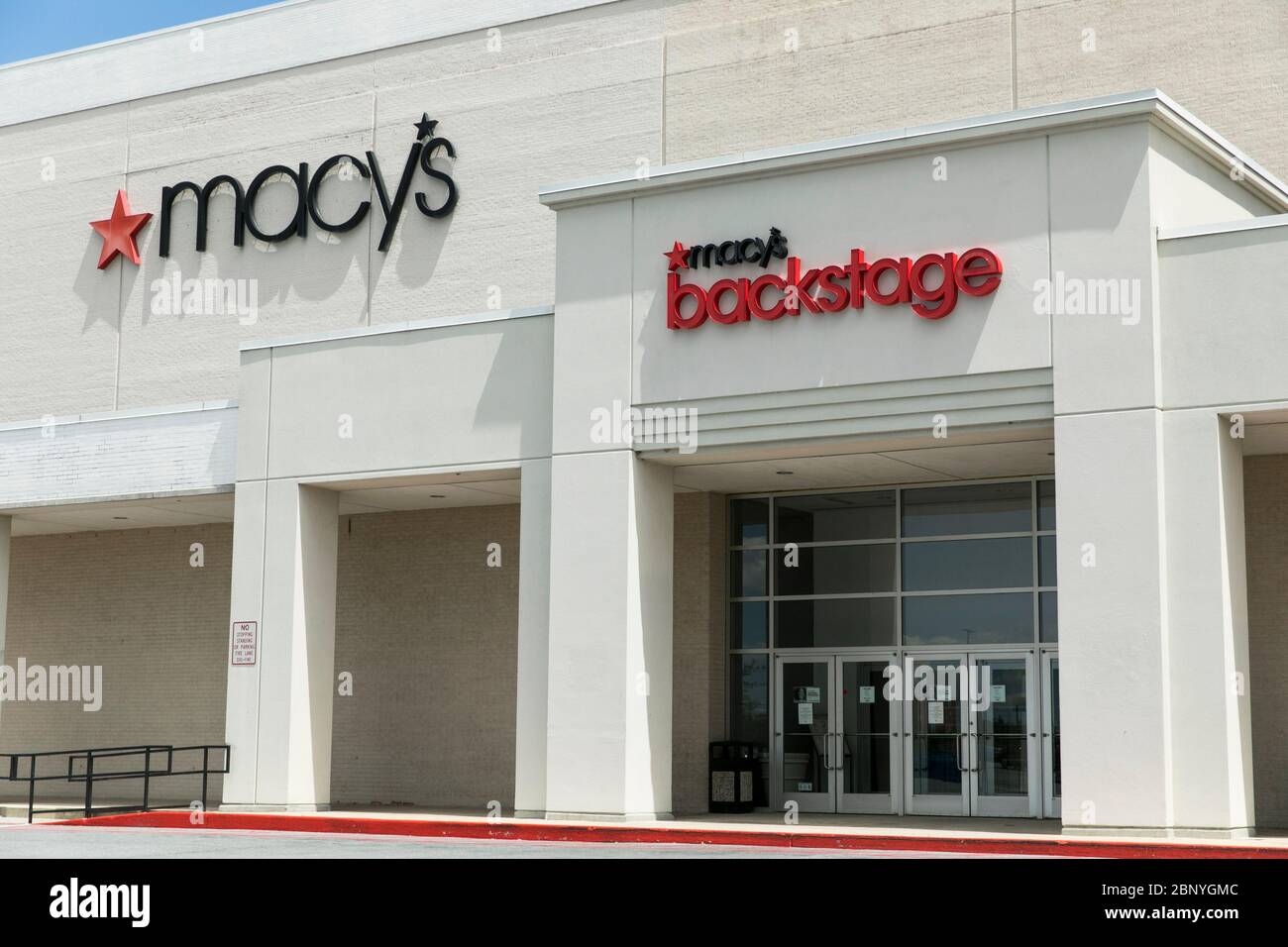 Logo signs outside of a Macy's and Macy's Backstage retail store locations in Harrisburg, Pennsylvania on May 4, 2020. Stock Photo