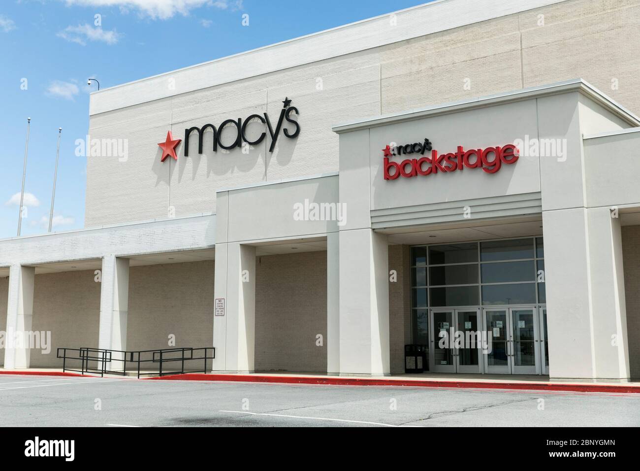 Logo signs outside of a Macy's and Macy's Backstage retail store locations in Harrisburg, Pennsylvania on May 4, 2020. Stock Photo