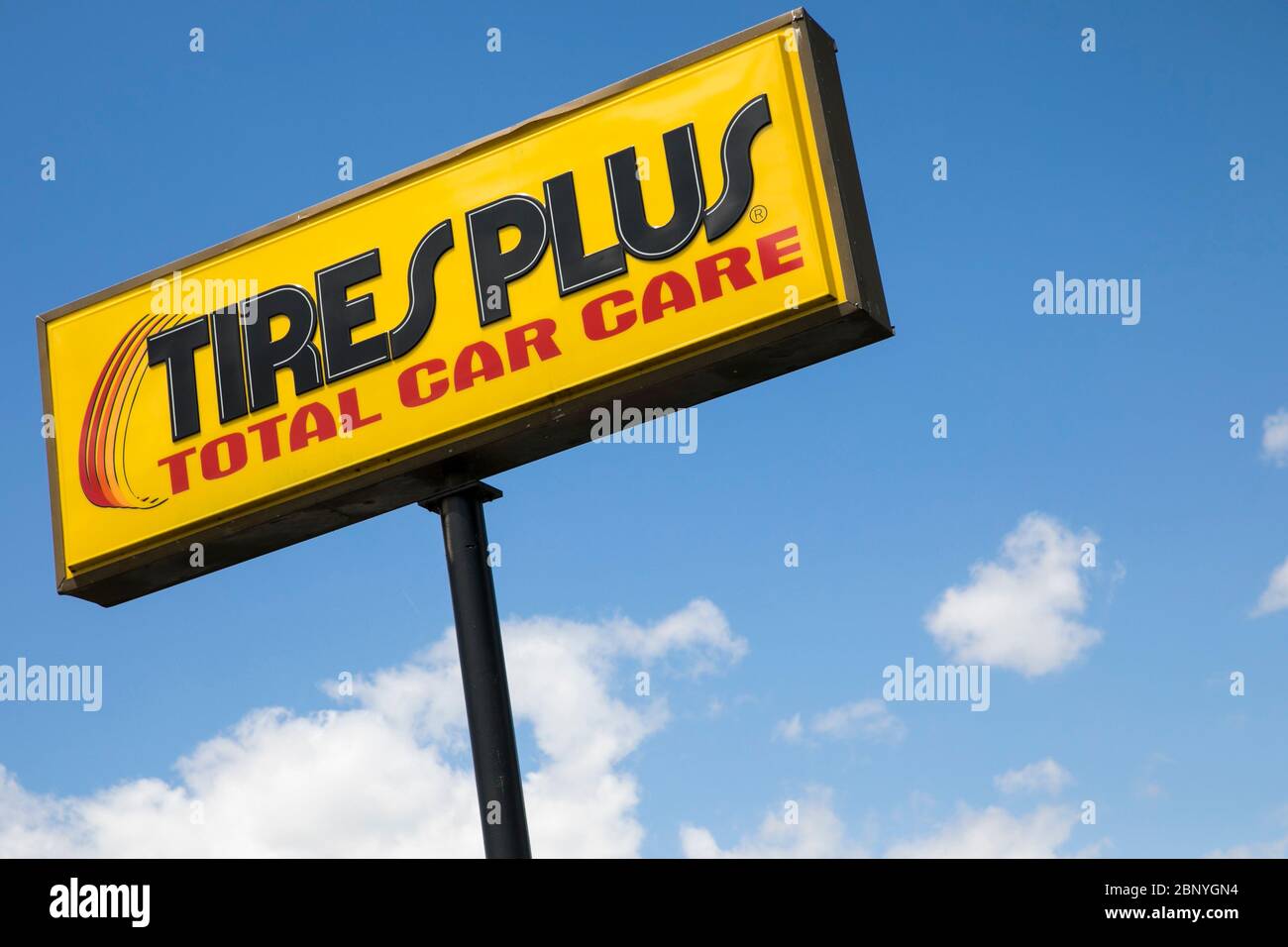 A logo sign outside of a Tires Plus retail store location in Harrisburg, Pennsylvania on May 4, 2020. Stock Photo
