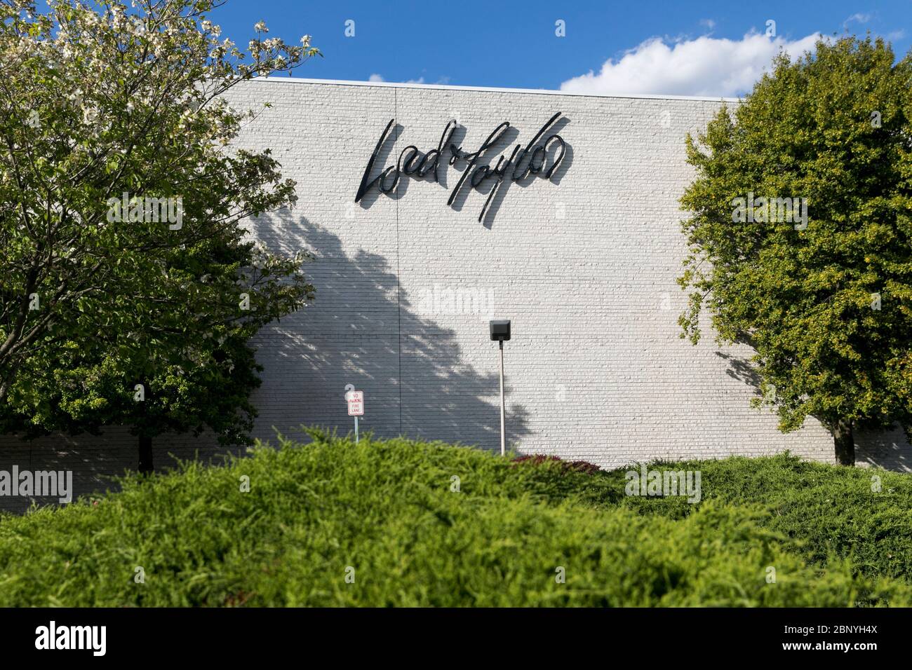 A logo sign outside of a Lord & Taylor department store location in Rockville, Maryland on May 7