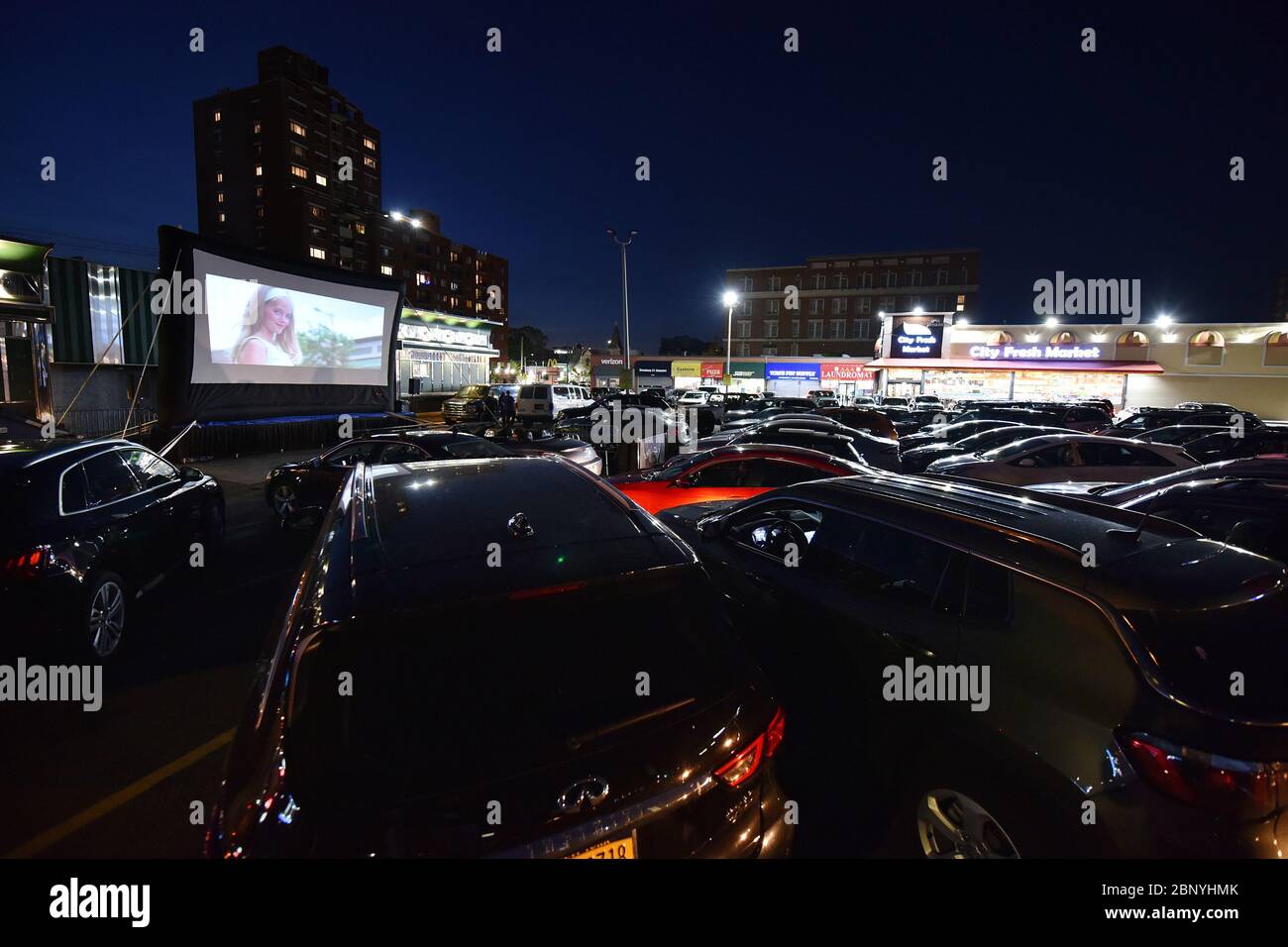 New York City, USA. 16th May, 2020. Bel Aire Diner in the Astoria neighborhood of Queens, has been transformed into a drive-in movie theatre during the COVID-19 pandemic, New York, NY, May 16, 2020. With restaurants limited to take-out under Coronavirus city rules, Bel Aire Diner allows motorist who reserved spots in their parking lot to order from the diner as they watch a movie. (Anthony Behar/Sipa USA) Credit: Sipa USA/Alamy Live News Stock Photo