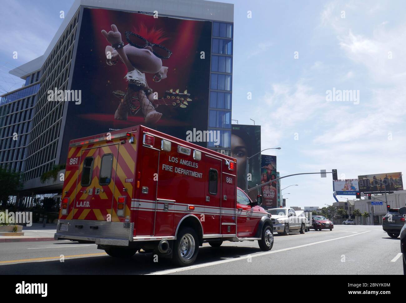 Los Angeles, California, USA 16th May 2020 A general view of atmosphere of Fire Truck and Traffic on with Trolls World tour Billboard on Sunset Blvd during Coronavirus Covid-19 Pandemic on May 16, 2020 in Los Angeles, California, USA. Photo by Barry King/Alamy Stock Photo Stock Photo